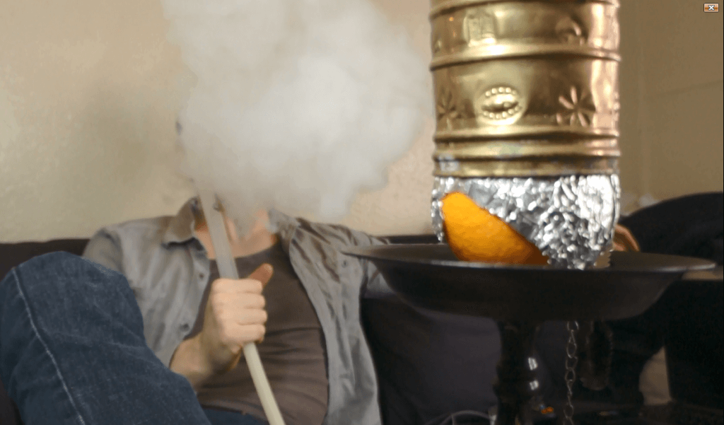 Smoking an Orange Hookah Bowl